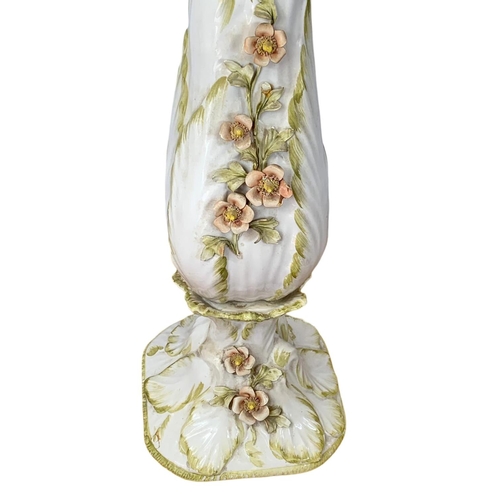 588 - A large Italian pottery jardiniere on stand. 92cm