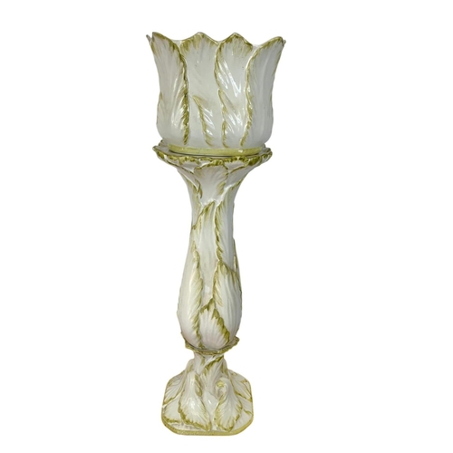 588 - A large Italian pottery jardiniere on stand. 92cm