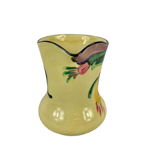 592 - A Wolstan Beswick Art Deco hand painted pottery jug. Number 3/7195. 16cm