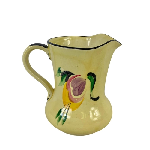 592 - A Wolstan Beswick Art Deco hand painted pottery jug. Number 3/7195. 16cm