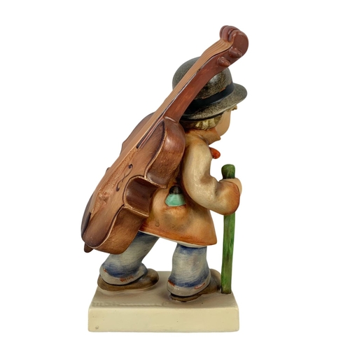 593 - A large M. J. Hummel Goebel pottery figure “Little Cellist” number 89/II 34. 18.5cm.