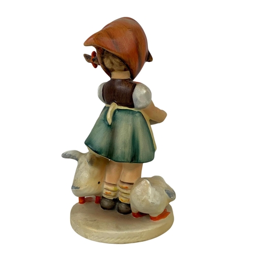 597 - A large vintage M. J. Hummel Goebel pottery figure “Be Patient”. Germany 1930. 17cm