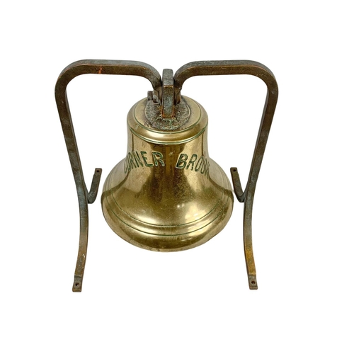 60a - A large early 20th century brass ships bell from the ship “Corner Brook” 43 x 40 x 49cm. Bell measur... 