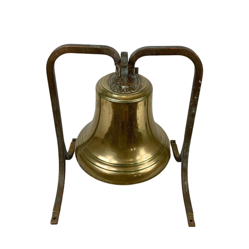 60a - A large early 20th century brass ships bell from the ship “Corner Brook” 43 x 40 x 49cm. Bell measur... 