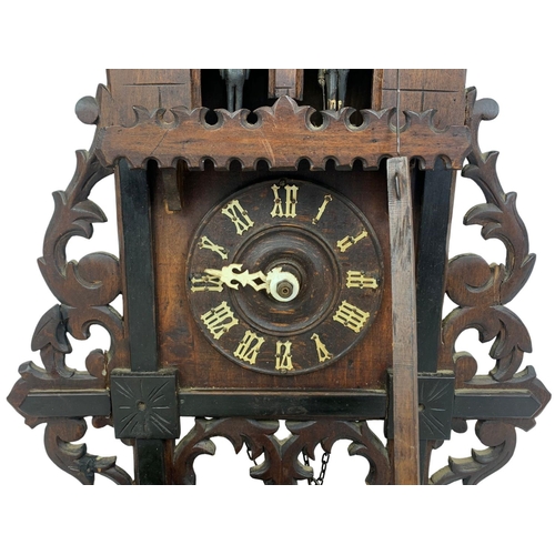 61 - Large late 19th century Black Forest cuckoo clock. With weights and pendulum. Circa 1890. 34 x 55cm