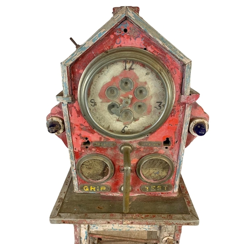 62 - An early 20th century amusement park Grip Test game. 72 x 64 x 173cm.