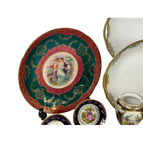 624 - Quantity of early 20th century porcelain. Including Limoges, Noritake, Vienna etc. Largest plate 26c... 