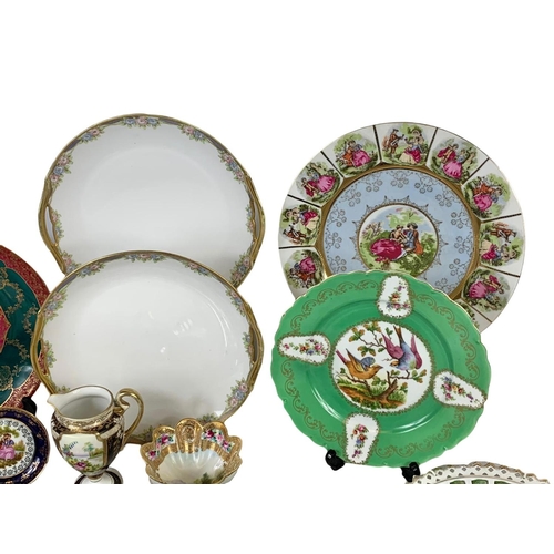 624 - Quantity of early 20th century porcelain. Including Limoges, Noritake, Vienna etc. Largest plate 26c... 