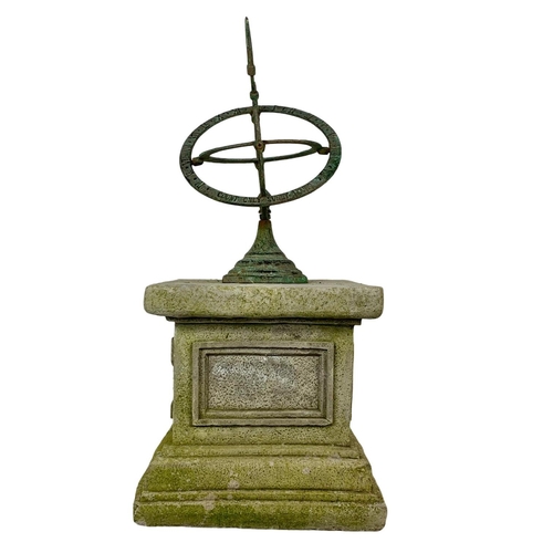 63 - A brass faux bronze sundial sphere on concrete plinth. 29 x 29 x 58cm.