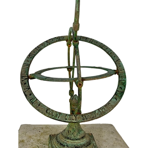 63 - A brass faux bronze sundial sphere on concrete plinth. 29 x 29 x 58cm.