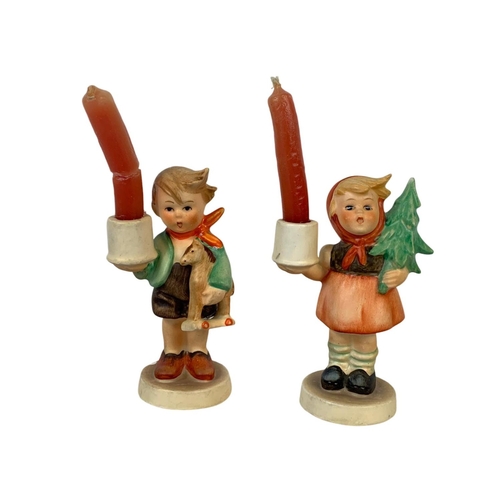 634 - M. J. Hummel Goebel pottery figures “Girl With Fir Tree” and “Boy With Horse” candleholders. Number ... 