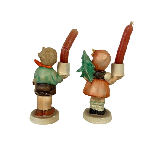 634 - M. J. Hummel Goebel pottery figures “Girl With Fir Tree” and “Boy With Horse” candleholders. Number ... 