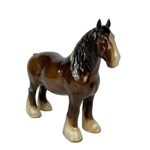 645 - A large Beswick Shire horse figure. 25 x 21.5cm.