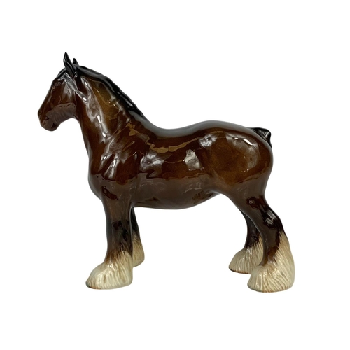 645 - A large Beswick Shire horse figure. 25 x 21.5cm.