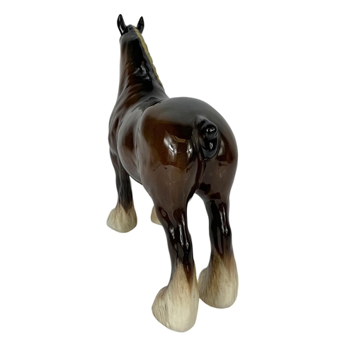 645 - A large Beswick Shire horse figure. 25 x 21.5cm.