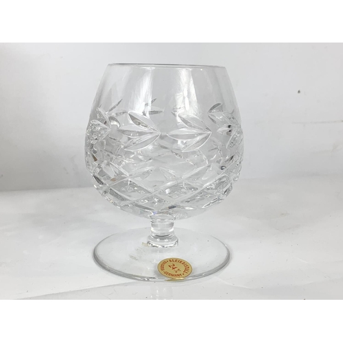 648 - A set of 6 French Pompadour crystal wine glasses in box and a pair of German crystal brandy glasses.