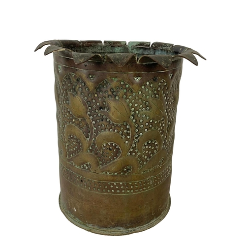 65 - An Arts & Crafts Trench Art pot. 21 x 22cm.