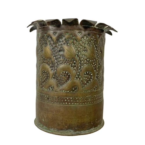 65 - An Arts & Crafts Trench Art pot. 21 x 22cm.