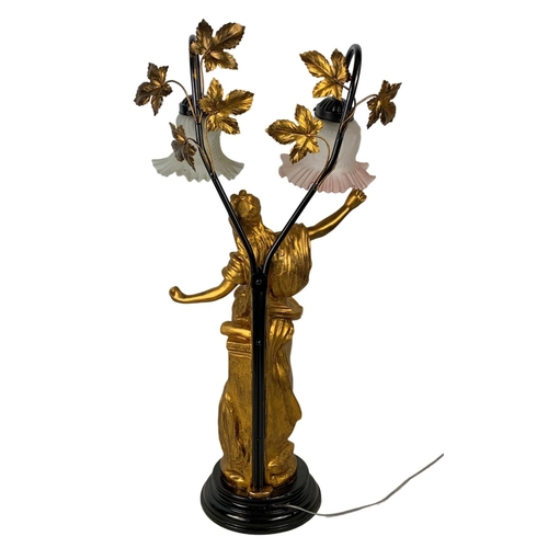 719 - A large ornate lamp. 75cm.