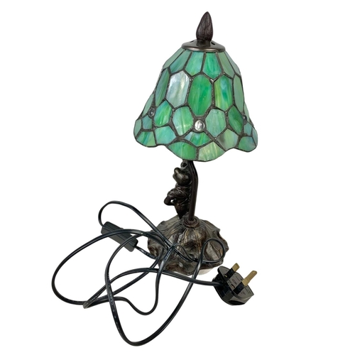 721 - A Tiffany style lamp. 34cm