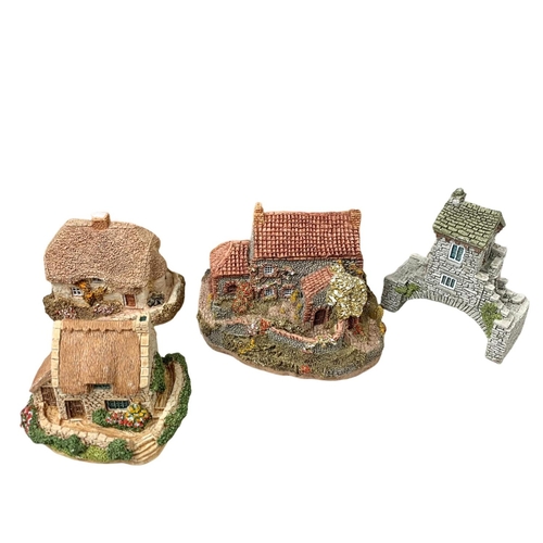 725 - 15 Lilliput Lane ornaments with 6 boxes. Including “Secret Garden” with box measuring figure measure... 