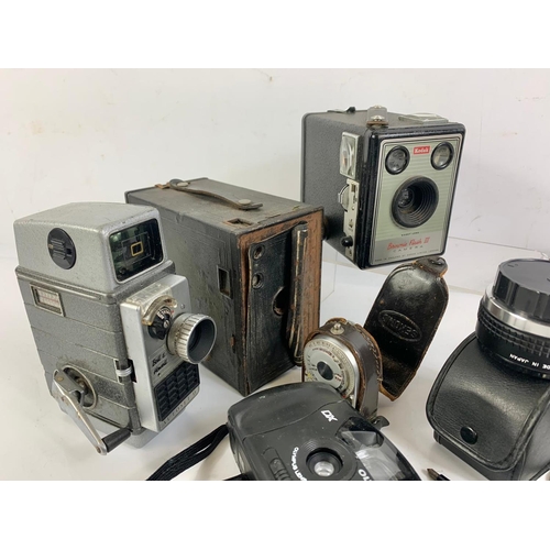 87 - Quantity of vintage cameras etc. Paxette camera, Kodak, Bell & Howell and more.