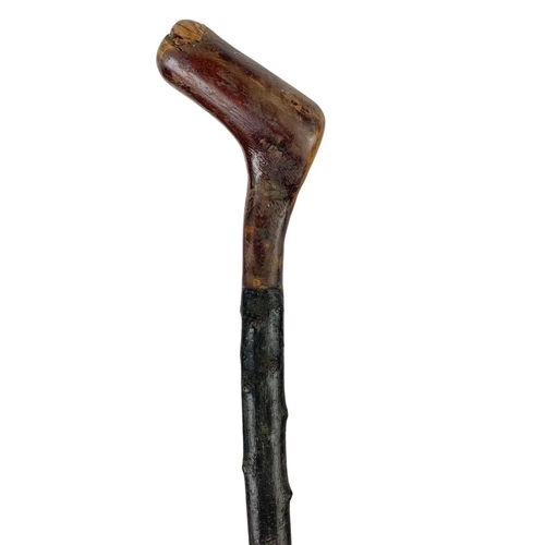 322 - A large Black Thorn thumb stick. 130cm