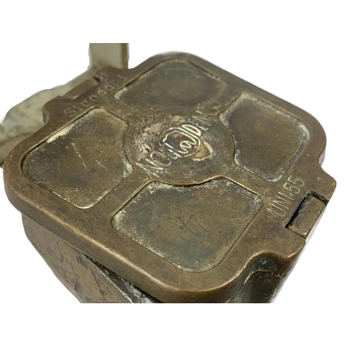 324a - An early 20th century bronze dental press. 11 x 15cm.