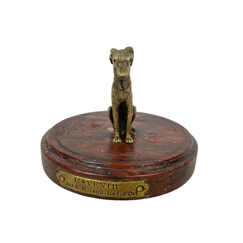 324i - An early 20th century marble base with brass plaque stamped Aug Moreau. With a vintage brass dog. 10... 