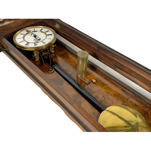 324k - A large Victorian walnut Vienna wall clock. With weight, pendulum and key. 116cm