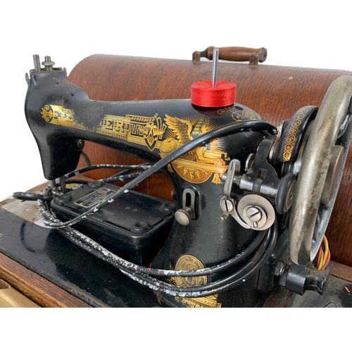 364 - A vintage Singer sewing machine. Number F6252478.