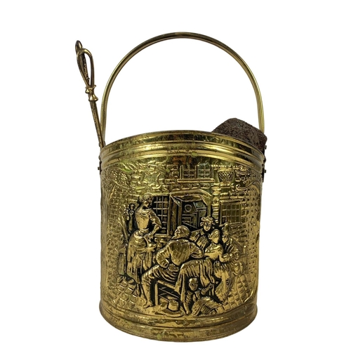 376 - A tall vintage brass companion set in the 18th century style and a vintage brass coal bucket. Compan... 