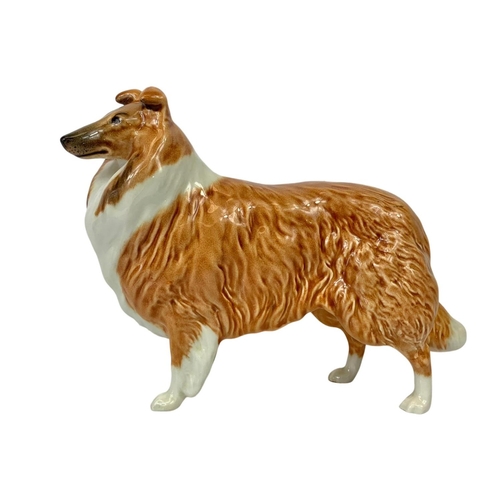 748 - 3 Beswick pottery dogs. Largest 19cm