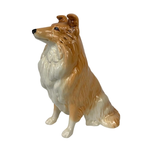 748 - 3 Beswick pottery dogs. Largest 19cm