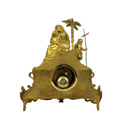 112a - A 19th century French ormolu gilt mantle clock. With key and pendulum. Circa 1870. 35 x 36cm