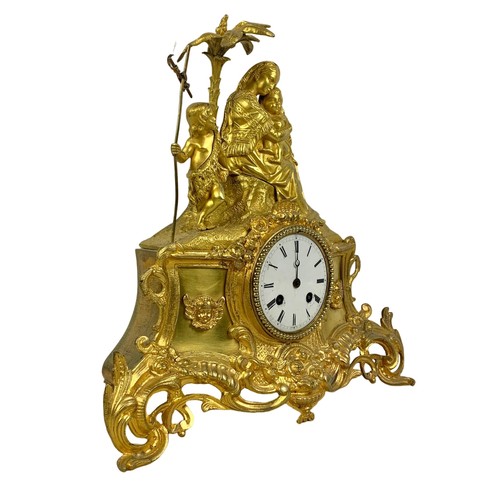 112a - A 19th century French ormolu gilt mantle clock. With key and pendulum. Circa 1870. 35 x 36cm