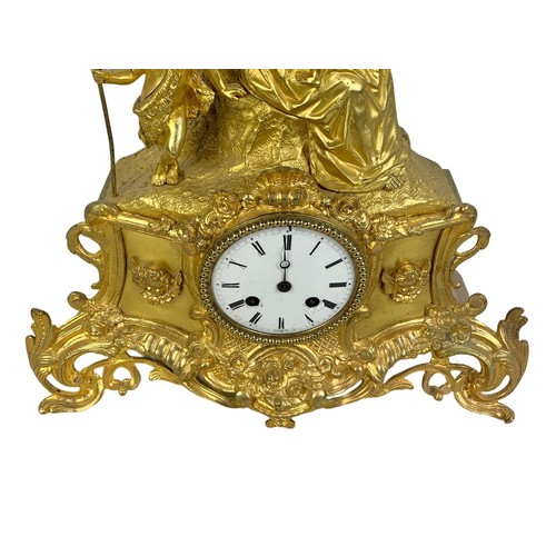 112a - A 19th century French ormolu gilt mantle clock. With key and pendulum. Circa 1870. 35 x 36cm