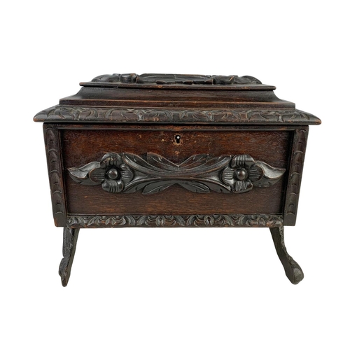 324t - A large 19th century Black Forest carved oak tea caddy. Circa 1870/1880. 38 x 26 x 29cm.