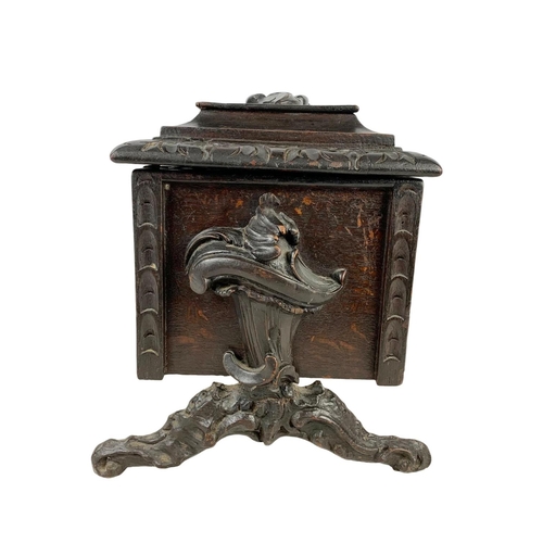 324t - A large 19th century Black Forest carved oak tea caddy. Circa 1870/1880. 38 x 26 x 29cm.