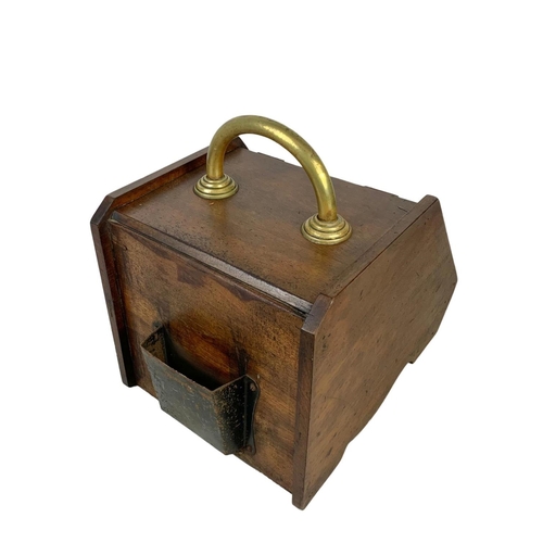 378 - An Edwardian walnut coal scuttle. 31.5 x 43 x 39cm.