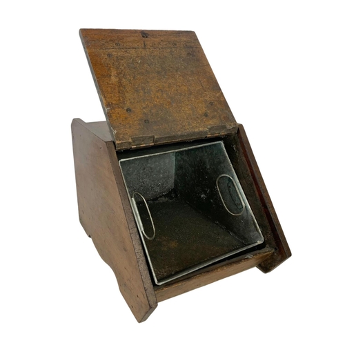 378 - An Edwardian walnut coal scuttle. 31.5 x 43 x 39cm.