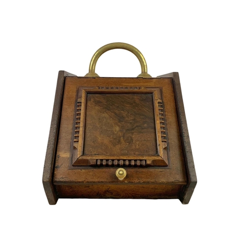 378 - An Edwardian walnut coal scuttle. 31.5 x 43 x 39cm.