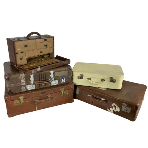 379 - 5 vintage cases. Largest measures 72cm