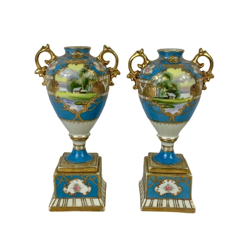 501g - A pair of early 20th century Noritake hand painted gilt porcelain urns. Circa 1908. 19cm.