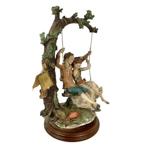 501f - A large Capodimonti figure “Lovers On A Tree” 43cm.