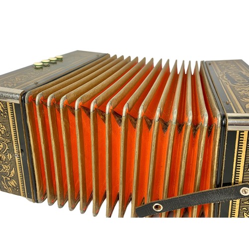 160d - A vintage Hohner pokerwork accordion 28 x 24 x 15cm when closed.