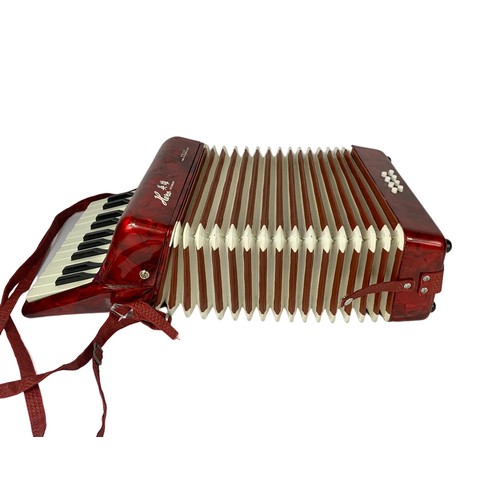 160e - A Heco accordion 28 x 29cm when closed