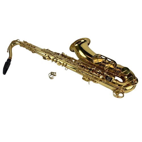 160F - A Saxophone in case. Saxophone measures 84cm. Case measures 80cm.