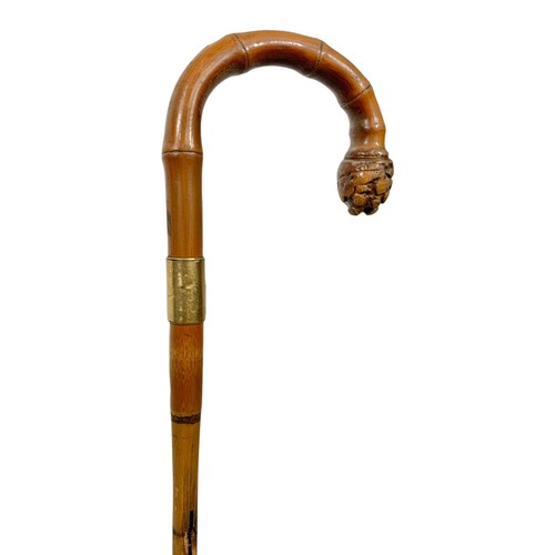 160N - 3 Victorian walking sticks. 2 silver mounted and 1 brass with carved walnut tip largest 92cm.