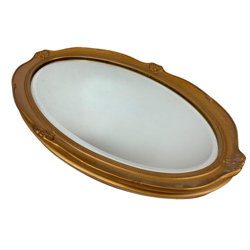 170b - A vintage ornate gilt framed mirror. 40 x 63cm.